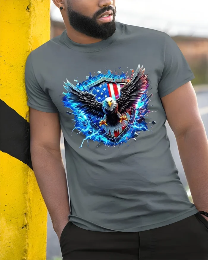 American Eagle Shield Tee Patriotic USA T-Shirt - model in grey shirt leaning against column