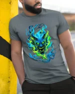 Neon Demon Face Colorful Monster Graphic T-Shirt - model in grey shirt leaning against column