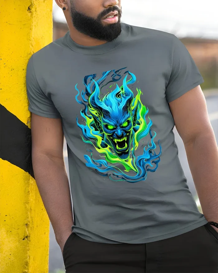 Neon Demon Face Colorful Monster Graphic T-Shirt - model in grey shirt leaning against column