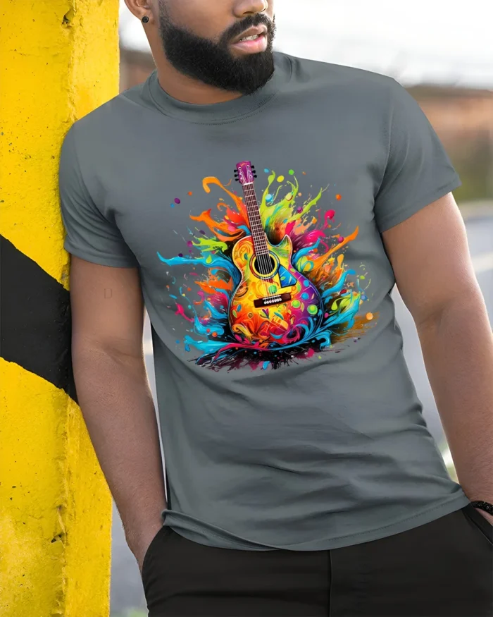 Groovy Guitar Tee Colorful Music Graphic Shirt - model in grey shirt leaning against column