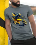 Michigan Wolverines Splash Football Fan T-Shirt - model in grey shirt leaning against column