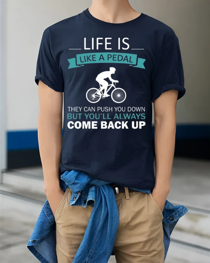 Life Is Like A Pedal Quote T-Shirt Motivational Cycling - model wearing navy shirt, hands in pockets
