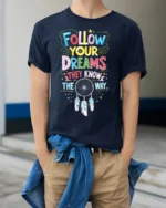 Follow Your Dreams T-Shirt Motivational Dreamcatcher - model wearing navy shirt, hands in pockets