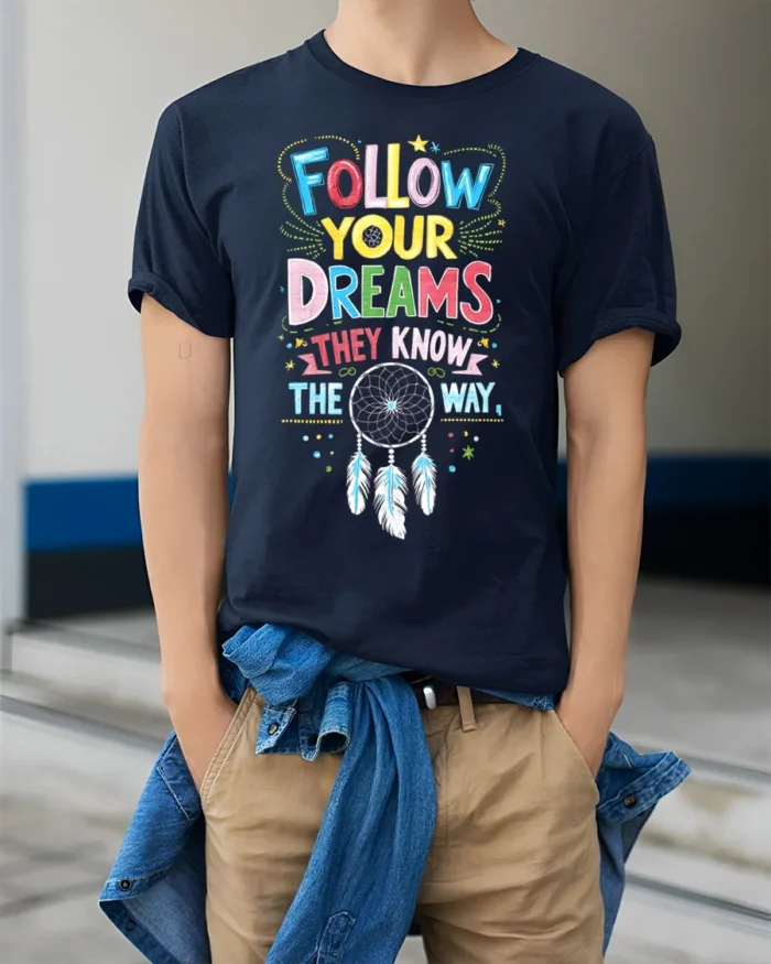 Follow Your Dreams T-Shirt Motivational Dreamcatcher - model wearing navy shirt, hands in pockets