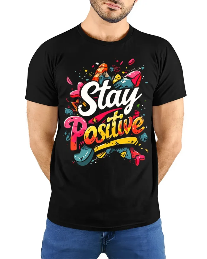 Stay Positive Motivational Graphic T-shirt for Men - model wearing black shirt, hands behind back