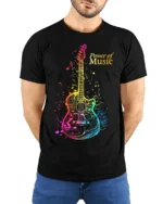 Power of Music Guitar T-shirt with Colorful Notes Art - model wearing black shirt, hands behind back