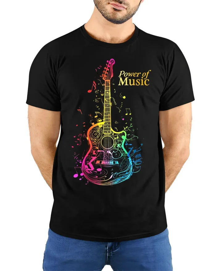 Power of Music Guitar T-shirt with Colorful Notes Art - model wearing black shirt, hands behind back