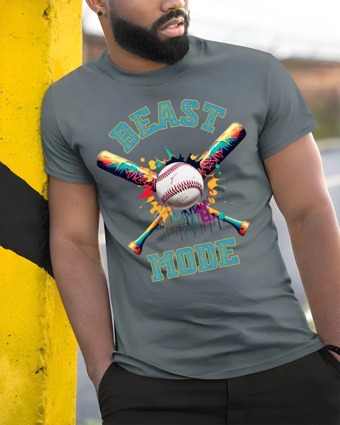 Beast Mode Baseball T-shirt with Colorful Bat Design - model in grey shirt leaning against column