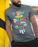 Follow Your Dreams T-Shirt Motivational Dreamcatcher - model in grey shirt leaning against column
