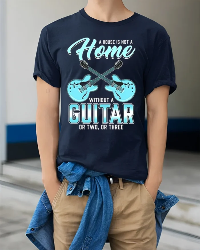 Guitar Lover T-Shirt A Home Needs Guitars Funny Quote - model wearing navy shirt, hands in pockets