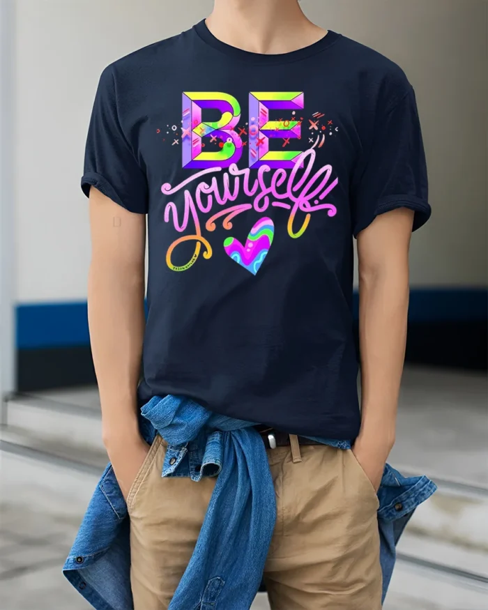 Be Yourself T-Shirt Colorful Self Love Pride Graphic - model wearing navy shirt, hands in pockets