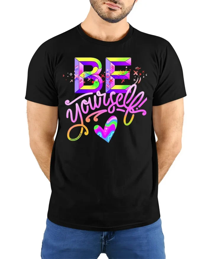 Be Yourself T-Shirt Colorful Self Love Pride Graphic - model wearing black shirt, hands behind back