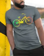 Color Splash Bicycle Art Print T-Shirt - model in grey shirt leaning against column