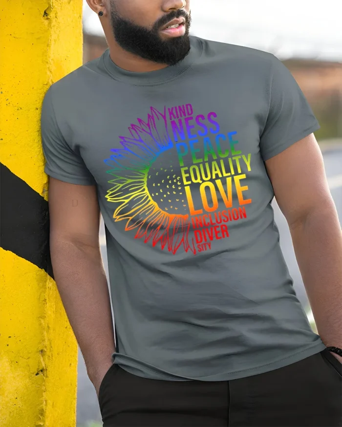 Rainbow Sunflower Equality T-Shirt Love and Inclusion - model in grey shirt leaning against column