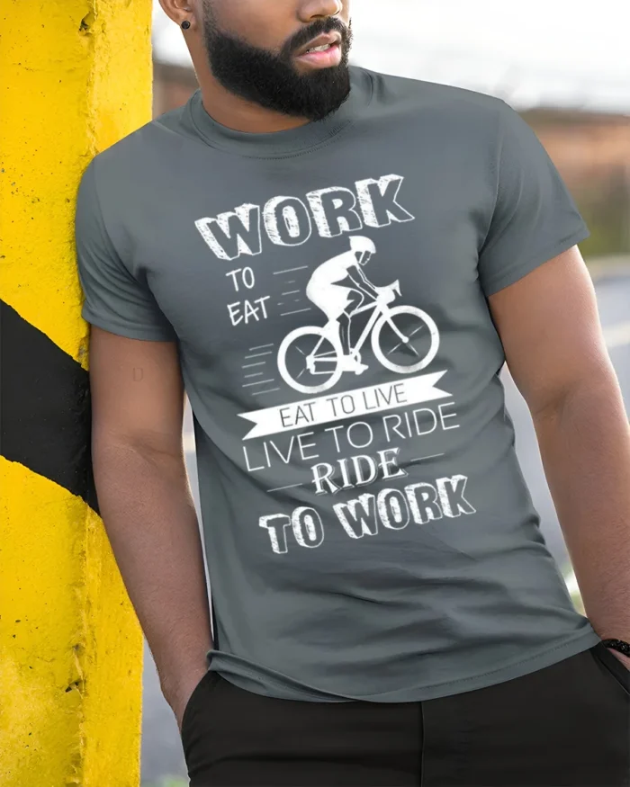 Ride to Work T-Shirt Work Eat Live Ride Cyclist - model in grey shirt leaning against column
