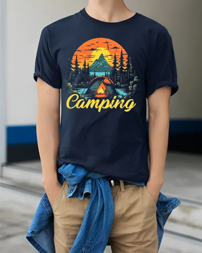 Vintage Camping T-Shirt Tent Fire Forest Mountain Sunset - model wearing navy shirt, hands in pockets