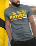 I Am Your Father Funny Sci-Fi T-Shirt for Star Fans - model in grey shirt leaning against column