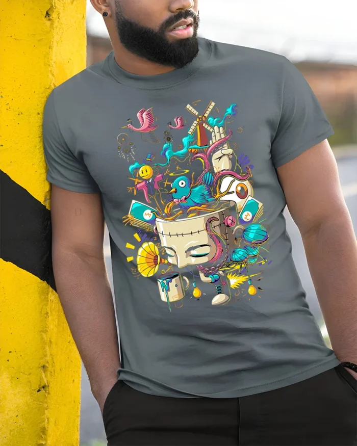 Surreal Art Explosion T-Shirt with Abstract Dream Design - model in grey shirt leaning against column