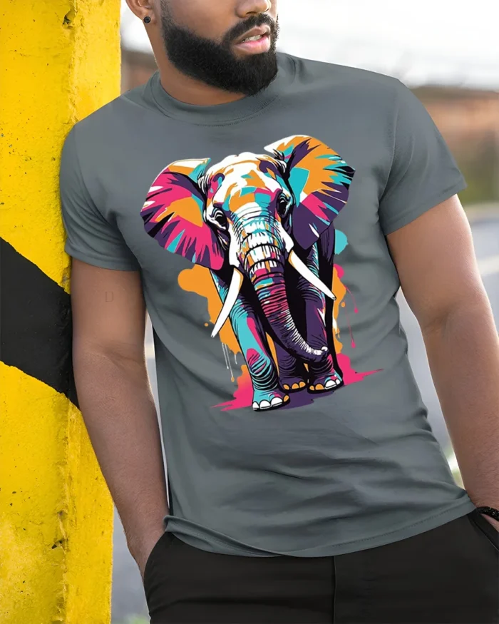 Colorful Elephant T-Shirt with Artistic Wildlife Design - model in grey shirt leaning against column