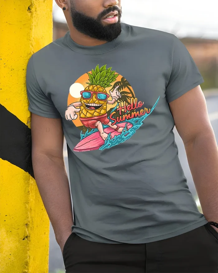 Hello Summer Pineapple T-Shirt with Surf Cartoon Design - model in grey shirt leaning against column