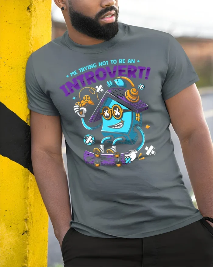 Funny Introvert T-Shirt Quirky Gamer Skater Cartoon - model in grey shirt leaning against column