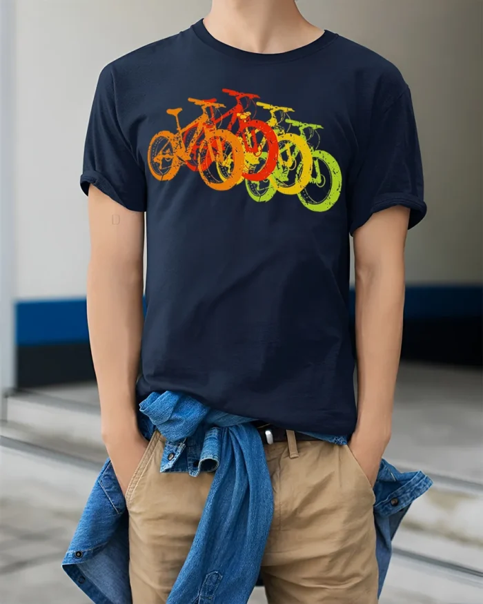 Retro Rainbow Bicycle T-Shirt Colorful Bike Rider - model wearing navy shirt, hands in pockets
