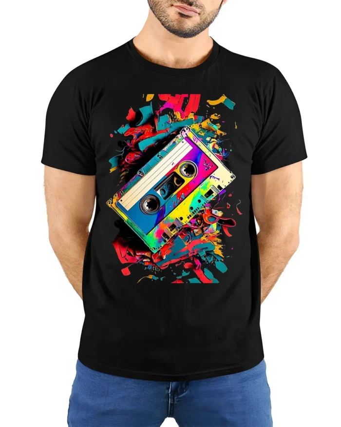 Retro Cassette Tape T-Shirt with Colorful Splash Art - model wearing black shirt, hands behind back