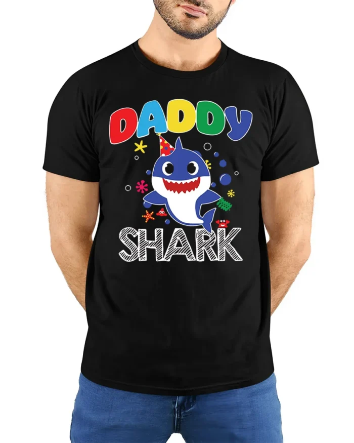Daddy Shark Birthday T-Shirt for Family Party Fun - model wearing black shirt, hands behind back