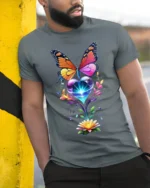 Colorful Butterfly and Heart Flower T-Shirt - model in grey shirt leaning against column