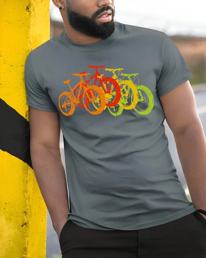 Retro Rainbow Bicycle T-Shirt Colorful Bike Rider - model in grey shirt leaning against column