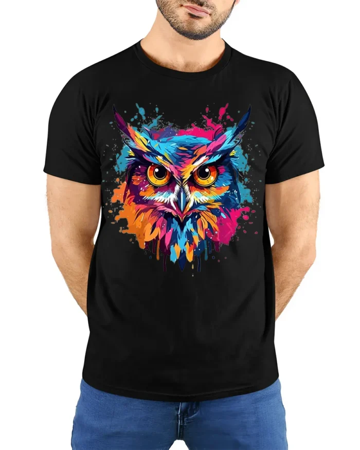 Color Splash Owl T-Shirt with Vibrant Artistic Design - model wearing black shirt, hands behind back
