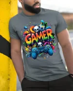 Colorful Gamer T-Shirt with Controller and Skull Graphics - model in grey shirt leaning against column