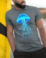 Glowing Blue Jellyfish T-Shirt for Ocean and Sea Lovers - model in grey shirt leaning against column