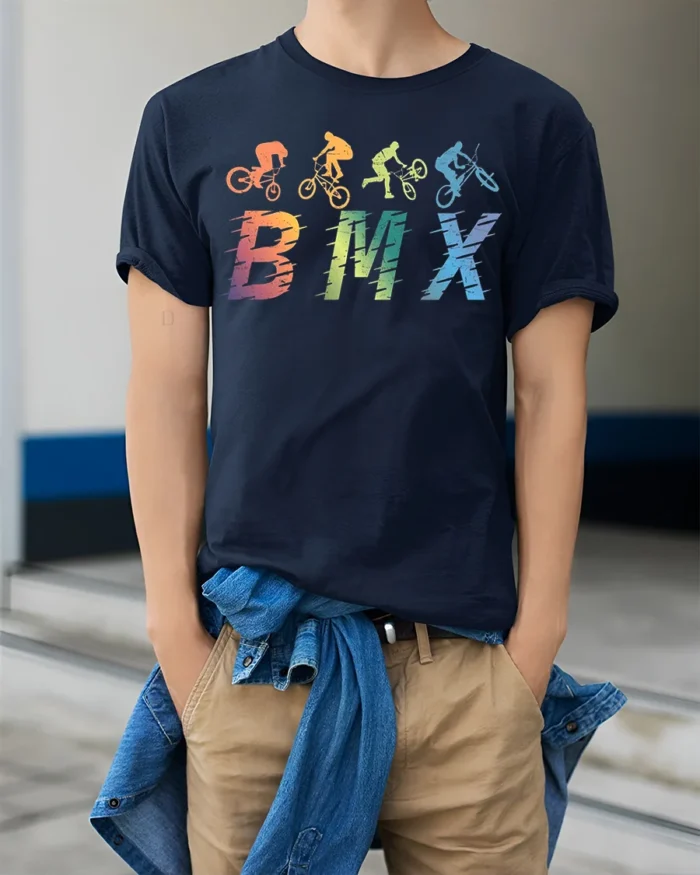 Retro BMX Trick T-Shirt Colorful Bike Rider Silhouette - model wearing navy shirt, hands in pockets