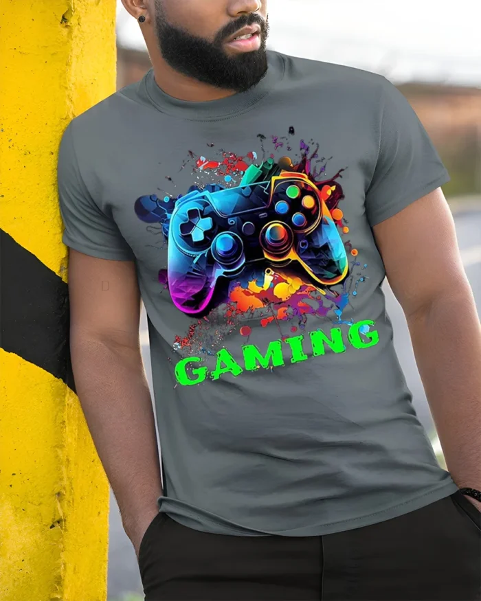 Vibrant Gaming Controller Graphic T-Shirt for Gamers - model in grey shirt leaning against column