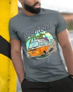 Tropical Beach Surf Van T-Shirt with Vintage Summer Vibe - model in grey shirt leaning against column