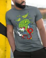 Trippy Brain Cartoon T-Shirt with Flying Eyeballs Design - model in grey shirt leaning against column