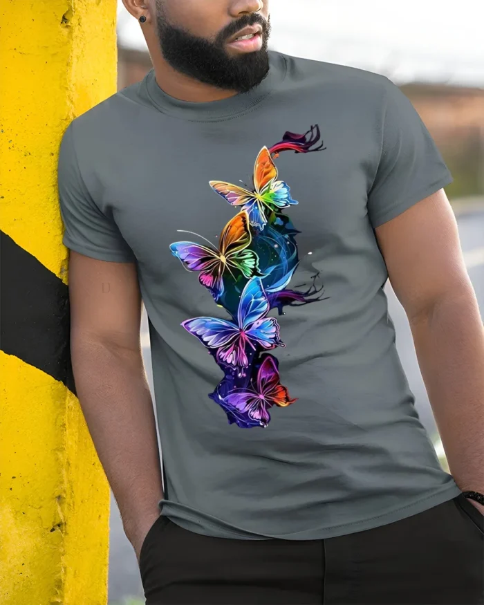 Colorful Butterfly Galaxy T-Shirt with Vibrant Art Print - model in grey shirt leaning against column