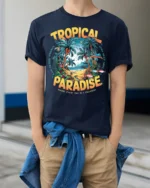 Tropical Paradise Graphic T-Shirt for Beach Vibes Lovers - model wearing navy shirt, hands in pockets