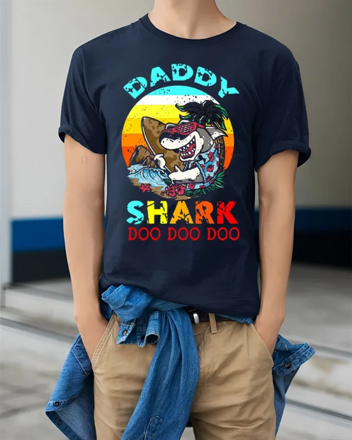 Daddy Shark Doo Doo Funny T-Shirt for Cool Beach Dads - model wearing navy shirt, hands in pockets