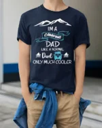 Camping Dad T-Shirt Funny Gift for Cool Outdoor Fathers - model wearing navy shirt, hands in pockets