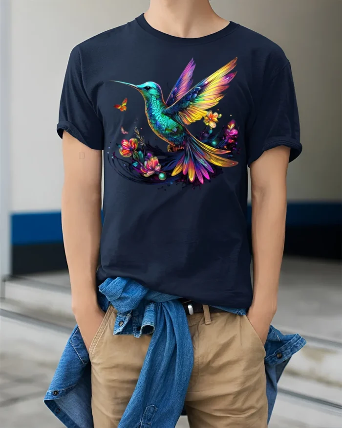 Colorful Hummingbird Floral Graphic T-Shirt for Nature Fans - model wearing navy shirt, hands in pockets