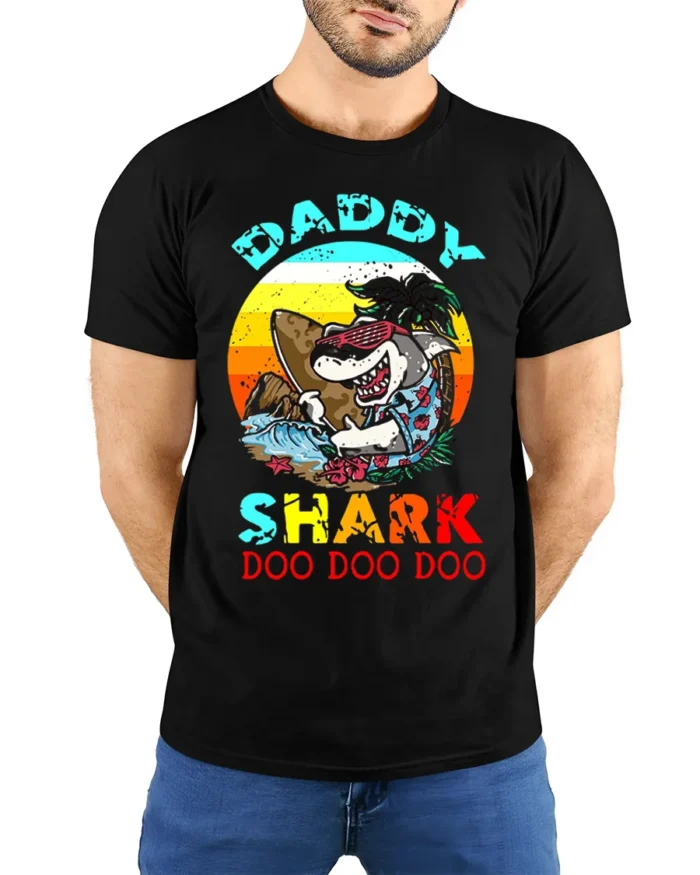 Daddy Shark Doo Doo Funny T-Shirt for Cool Beach Dads - model wearing black shirt, hands behind back