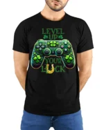 Level Up Your Luck Gaming T-Shirt with Shamrock Controller - model wearing black shirt, hands behind back