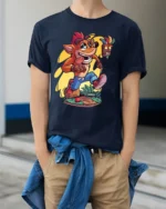 Retro Gamer T-Shirt Fun Orange Cartoon Mascot - model wearing navy shirt, hands in pockets