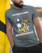Father Son Best Friends Puzzle Autism Support T-Shirt - model in grey shirt leaning against column