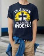 He Is Risen Indeed Christian T-Shirt Easter Faith - model wearing navy shirt, hands in pockets