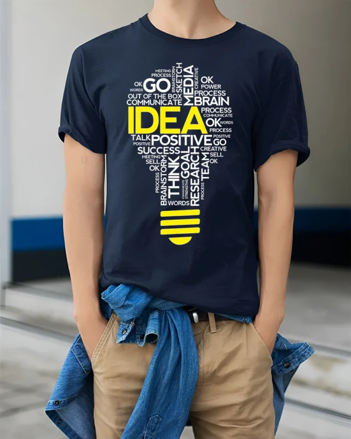 Creative Idea Lightbulb T-Shirt Motivational Graphic - model wearing navy shirt, hands in pockets