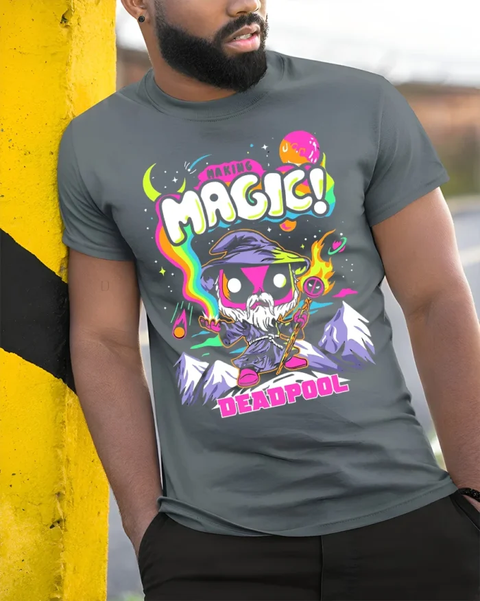 Making Magic Deadpool T-Shirt Funny Wizard Comic - model in grey shirt leaning against column