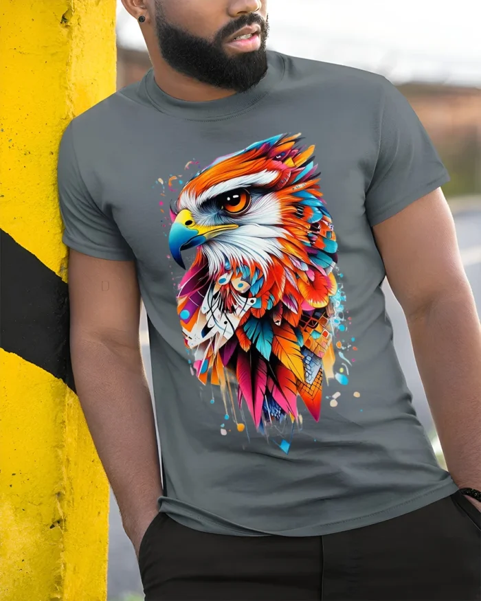 Colorful Eagle Art T-Shirt Bold Feather Graphic - model in grey shirt leaning against column